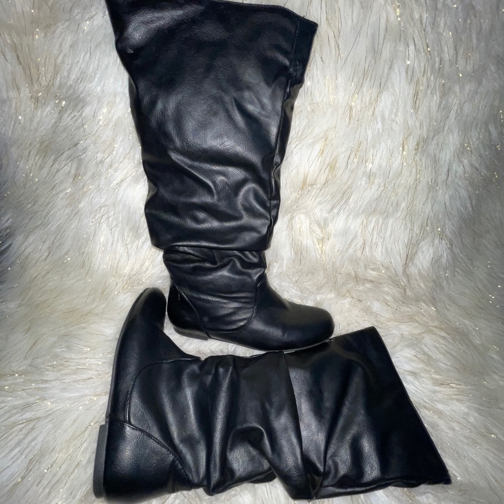 Black calf length boots